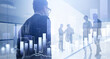 © ImageFlow - Diverse business people working together. Skyscrapers and stock market dynamics, line and bar charts, double exposure. Concept of financial advisor and international consulting. Panoramic office