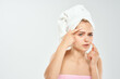 © SHOTPRIME STUDIO - woman with towel on head health clean skin point on face