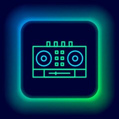 Canvas Print - Glowing neon line DJ remote for playing and mixing music icon isolated on black background. DJ mixer complete with vinyl player and remote control. Colorful outline concept. Vector