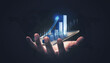© Lemonsoup14 - Businessman holding stock tablet and market economy graph statistic showing growth of profit analyzing financial exchange on increase digital money background with trade chart finance data concept.