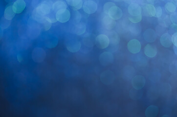 Wall Mural - abstract blue bokeh glitter sparkle background.