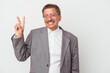 © Asier - Middle aged indian business man isolated on white background joyful and carefree showing a peace symbol with fingers.