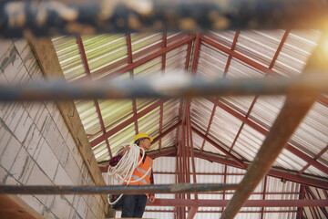 Wall Mural - Roofer Construction worker install new roof,Roofing tools