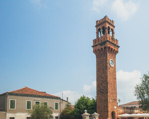 Wall Mural - Clock Tower at Campo Santo Stefano on island of Murano, Venice, Italy