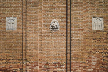 Canvas Print - Relief sculptures on walls of Basilica of Santi Maria e Donato on island of Murano, Venice, Italy