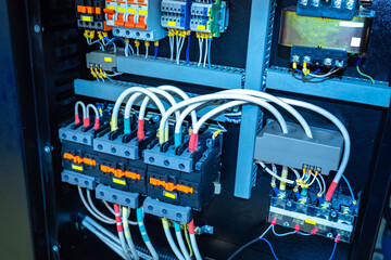 Poster - electrical equipment. electric control cabinet inside view. electricity control board. switches for 