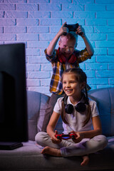 Poster - children playing video game with game console