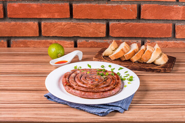 Wall Mural - sausage portion with wood and brick background