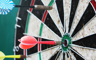 Darts target closeup. Success hitting target aim goal achievement concept