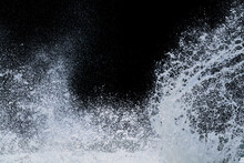 Splashing Of Sea Wave Crashing On Shore Spraying White Water Foam