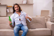 © Elnur - Young man drinking alcohol at home