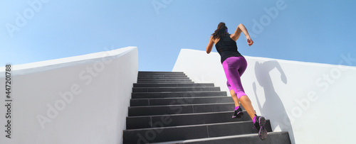 Stairs running workout athlete runner woman jogging doing hiit step up staircase high intensity interval training. Panoramic banner of active people lifestyle.