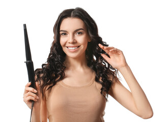 Poster - Beautiful young woman with curling iron on white background