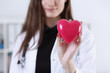 © H_Ko - Female medicine doctor hands holding red heart