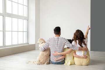 Canvas Print - Happy family with dog in their new flat