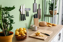 Set Of Knives And Lemons On Counter In Kitchen