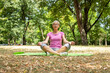 © littlewolf1989 - Elderly caucasian woman meditate and doing yoga exercise.