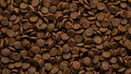 Pet dry food top view. Pile of cat or dog pellets