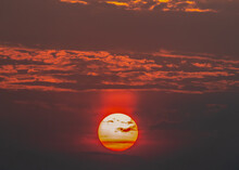 Red Sun Set In The Sky