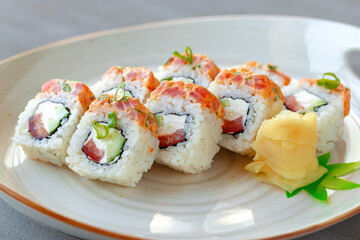 Wall Mural - Japanese sushi roll with salmon on plate