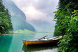 Leinwandbild Motiv Natural landscap of the mountain lake in the .Switzerland. Boat on the mountain lake