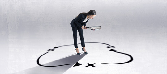 Aufkleber - Right way concept with businesswoman looking through a magnifying glass on road route drawn on light floor.
