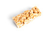  Peanut brittle isolated on white background. Peanuts in caramel. Natural candy bar.
