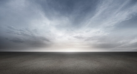 Wall Mural - beautiful sky clouds sunset horizon background with empty dark floor