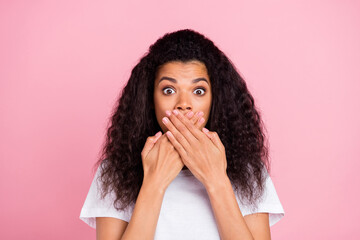 Sticker - Photo of scared impressed dark skin lady wear white t-shirt arms cover lips isolated pink color background