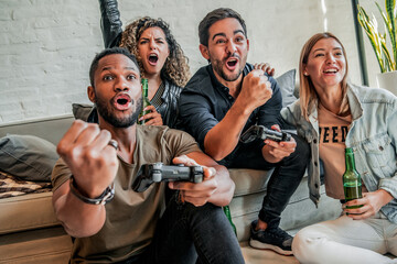 Wall Mural - Group of friends playing video games together.