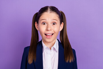 Canvas Print - Photo of shocked funky school girl wear blue uniform open mouth big eyes isolated purple color background