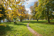 Spa Garden Mondsee, At The Lakeside, Beautiful Autumn Landscape With Footpath And Golden Leaves