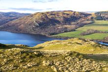 Looking Across Ullswater In The English Lake District To Gowbarrow Fell From Hallin Fell, Martindale, Cumbria UK