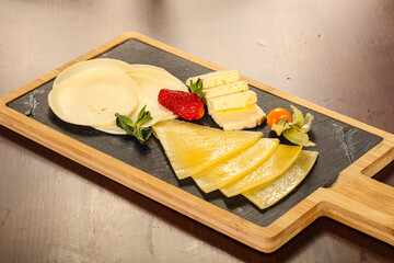 Wall Mural - Cheese plate mix snack appetizer