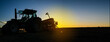 © JOE LORENZ DESIGN - Farmer with tractor equipment on field by sunset Harvest equipment.