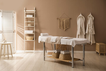 Canvas Print - Stylish spa salon interior with massage table