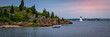 Palmer Island Light Station in the Acushnet River in New Bedford Harbor, Massachusetts. Panoramic Sunset Seascape with Lighthouse.