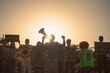 © Alessandro Biascioli - Demonstrators group protesting for climate change - Multiracial people fighting on road holding banners on environments disasters - Global warming concept