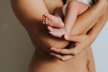 Mother Holding Her Infant Baby