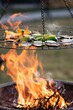 Grilled vegetables and big flames of fire, iron barbecue grill