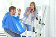 © aletia2011 - Man having a haircut from female hairdresser at salon