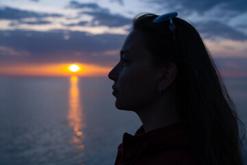 girl at sunset at sea