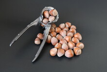 Fresh And Organic Nuts. Nut Cracking Tool.