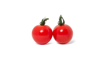 Group of two shiny red organic tomato isolated on white background