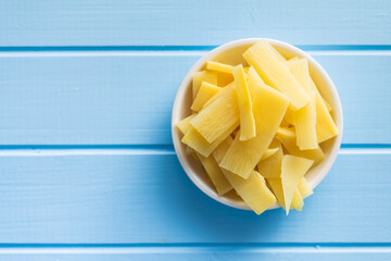 Sticker - Sliced canned bamboo shoots in bowl.