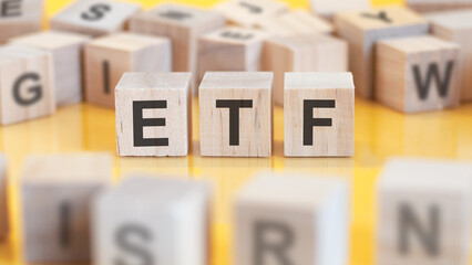 Poster - word etf written on wood blocks, concept