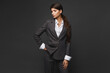 © innarevyako - Isolated studio portrait of a confident businesswoman in a grey stylish suit