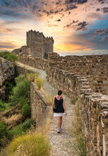 Woman Doing Tourism In The Castle Of Alburquerque, Badajoz, Spain.