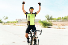 Latin Man Celebrating His Victory In Cycling