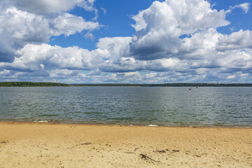 Wall Mural - Beautiful natural summer landscape with picturesque lake Senezh and cloudy sky. Moscow region, Russia